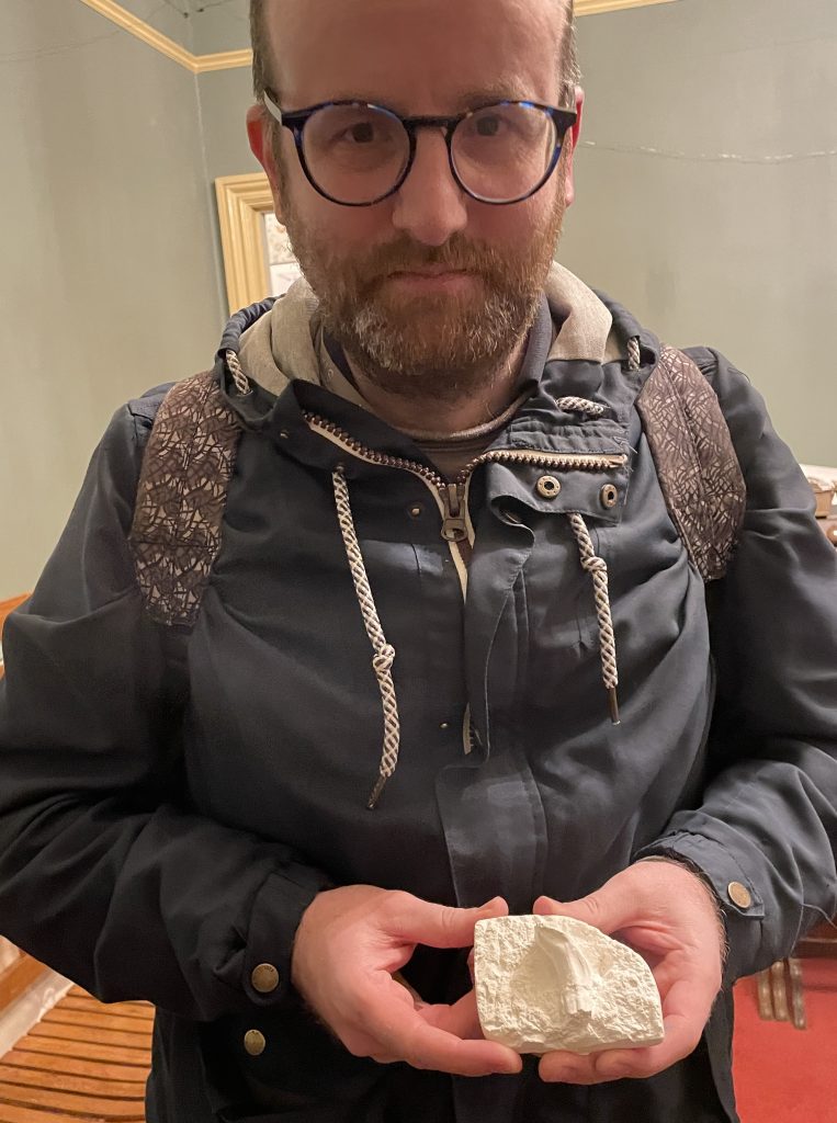 philhadland with iguanodon tooth